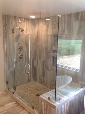 owner's bathroom shower with glass walls